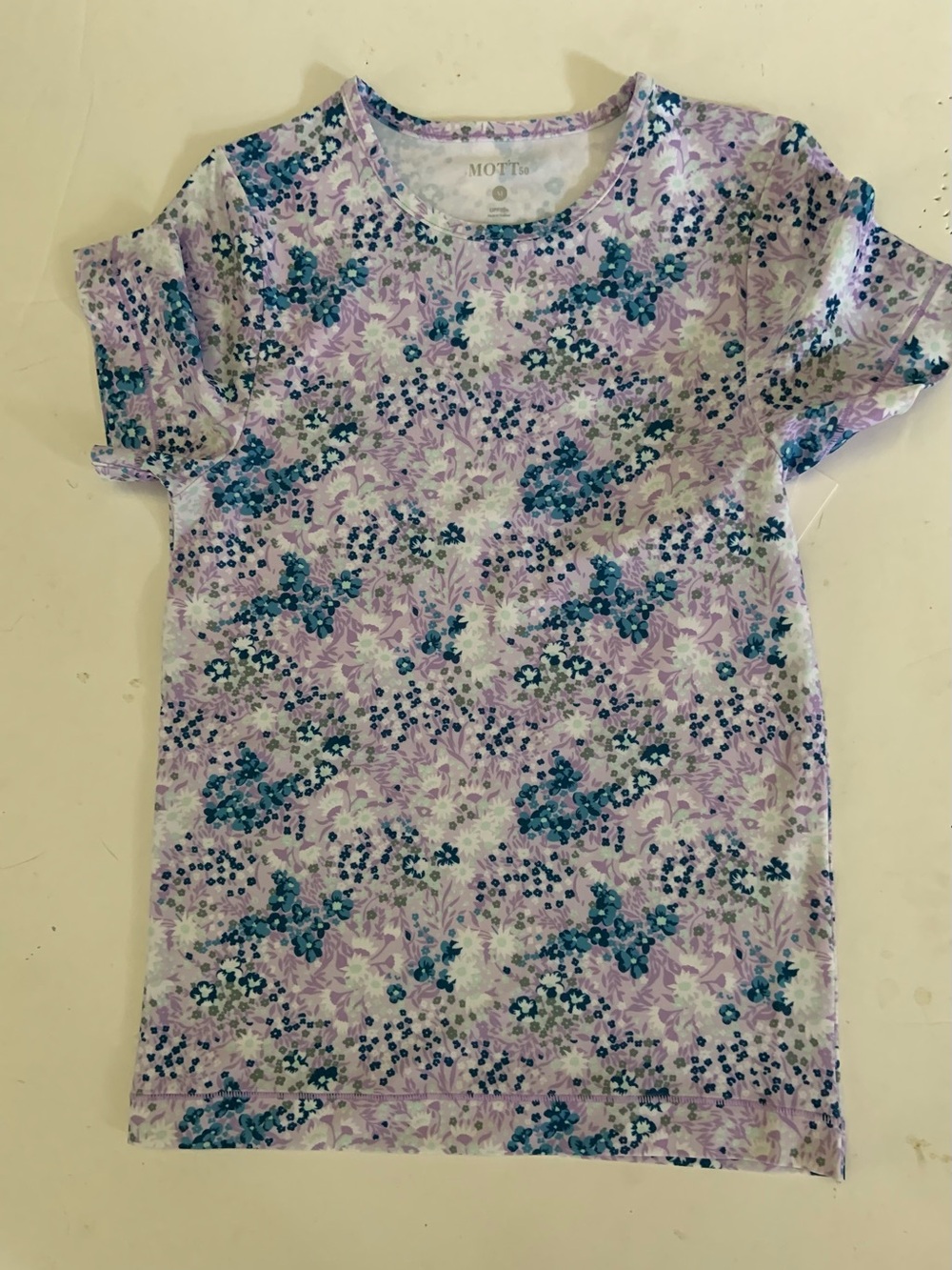 Coolibar Lavender Tee with Blue Floral Pattern